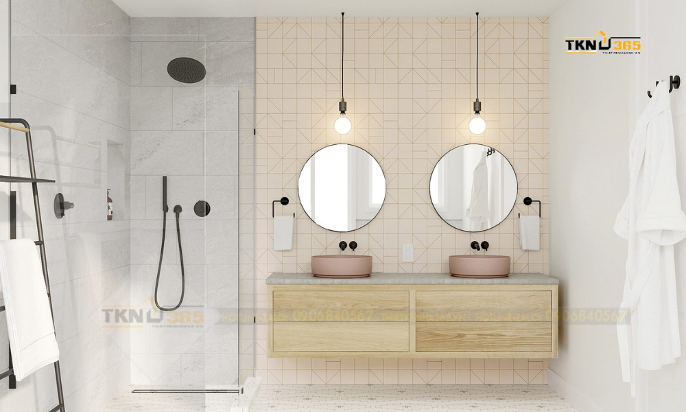 Phòng tắm này được trang trí bằng các vật dụng như gương tròn, đèn dây tóc, gạch ốp tường lạ mắt tạo nên một không gian đầy cảm giác retro