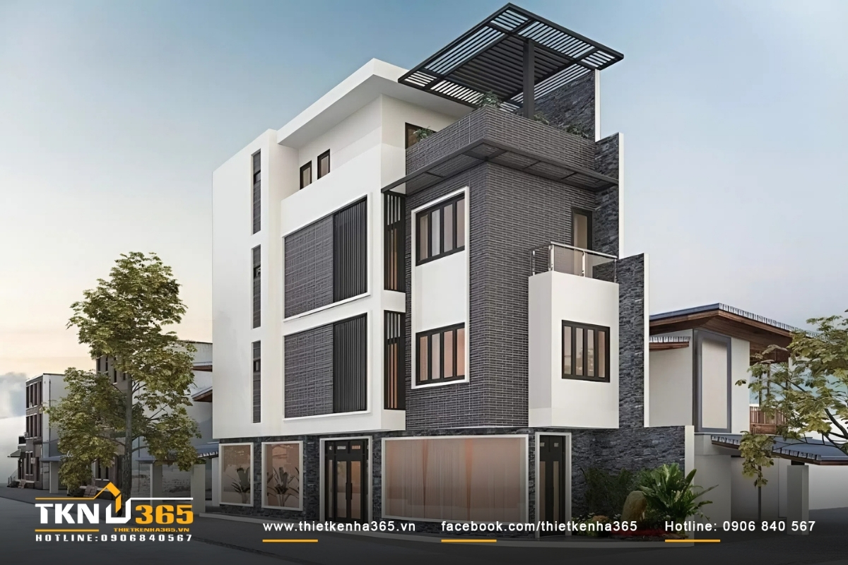 Nhà 2 mặt tiền 4 tầng kiến trúc hiện đại với gam màu đen chủ đạo, cửa sổ và cây xanh trang trí