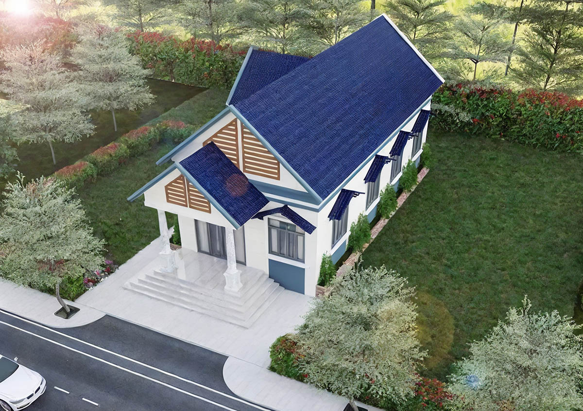 Mái ngói màu xanh dương nổi bật giữa sân vườn xanh rộng lớn