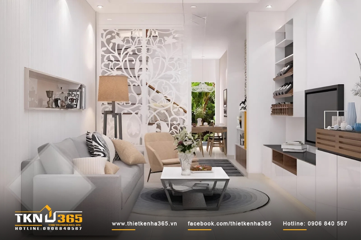 Ph&ograve;ng kh&aacute;ch được b&agrave;i tr&iacute; đơn giản với hai gam m&agrave;u trắng x&aacute;m