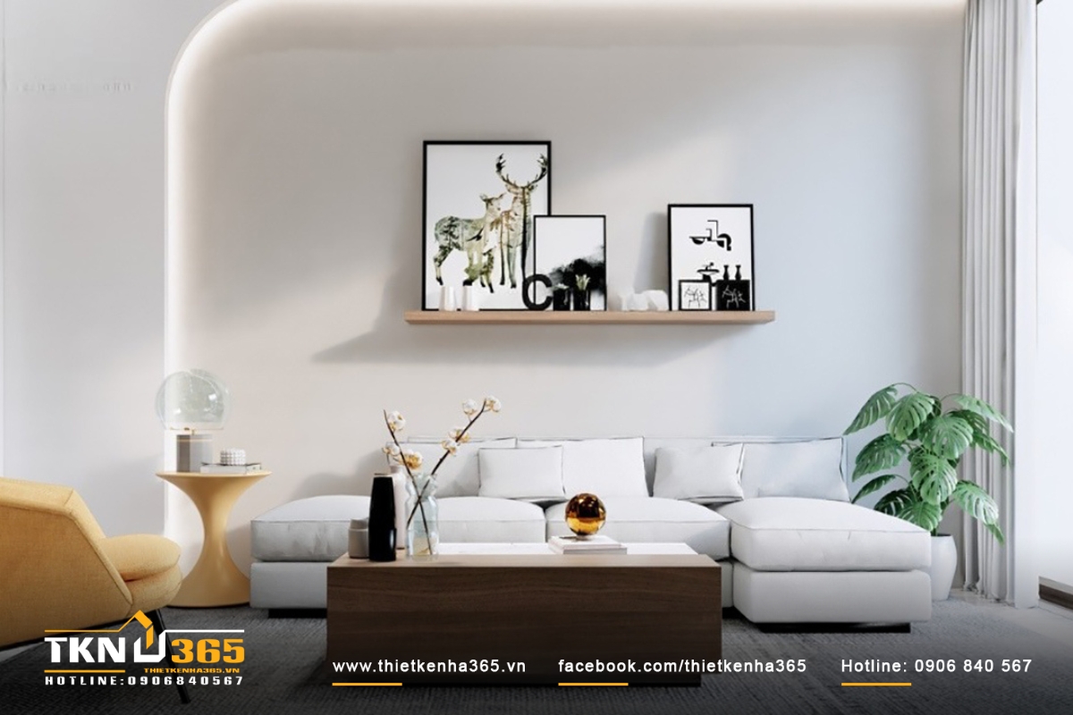 Góc tiếp khách được bố trí với một bộ ghế sofa thoải mái và bàn trà, tạo nên không gian thư giãn và trò chuyện