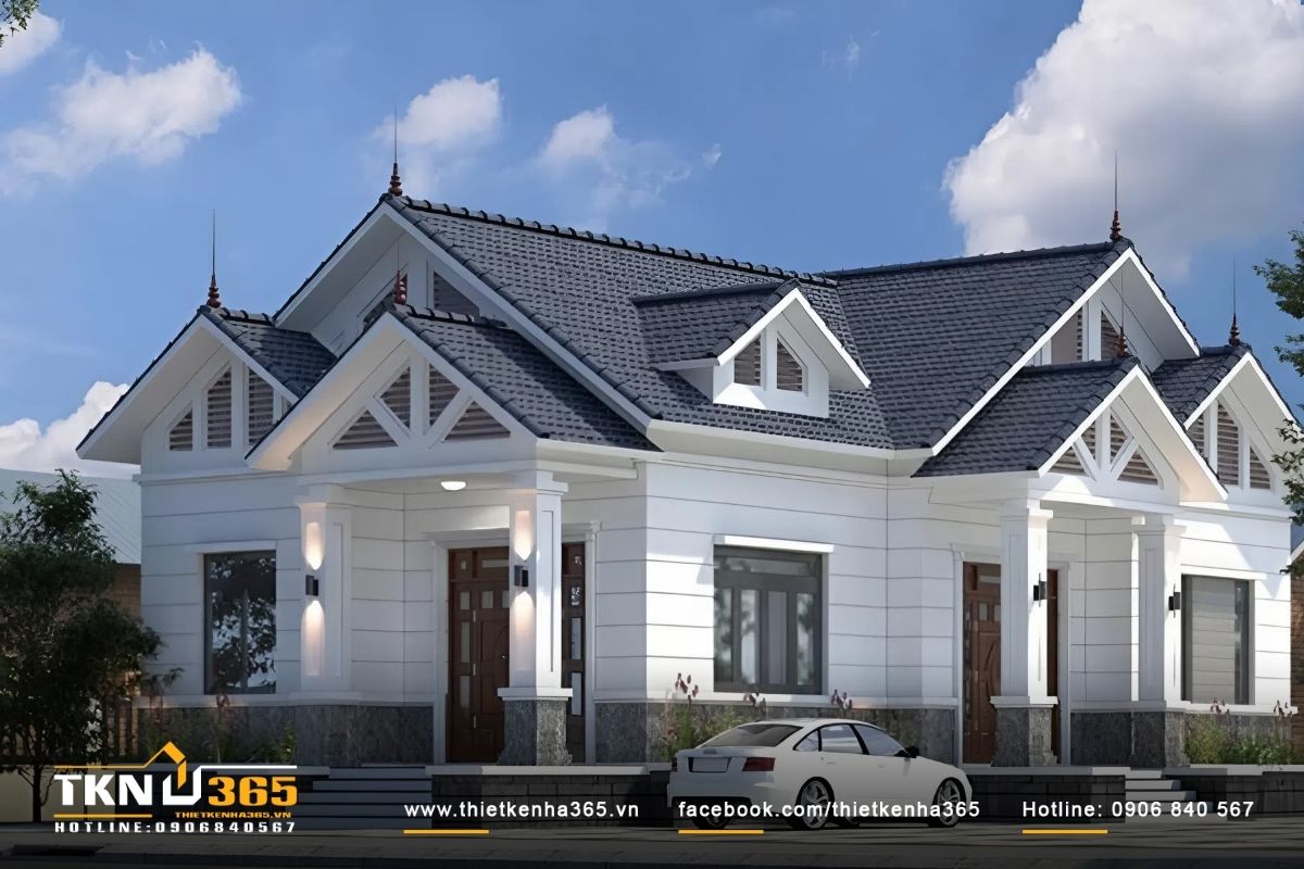 M&ocirc; h&igrave;nh kiểu nh&agrave; cấp 4 đẹp m&aacute;i th&aacute;i với t&ocirc;ng m&agrave;u trầm, sự kết hợp giữa xanh đậm v&agrave; x&aacute;m nhạt