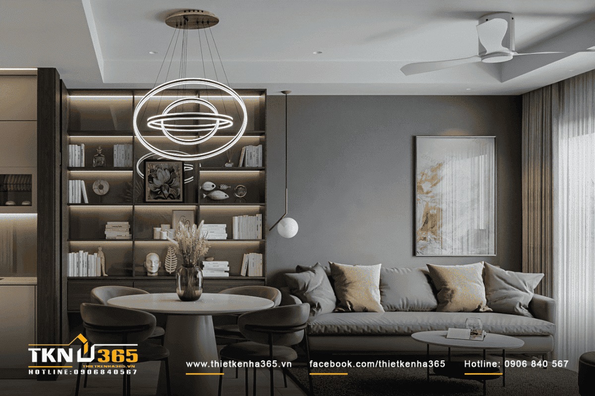 Phòng khách nhỏ xinh với điểm nhấn là chiếc đèn chùm độc đáo và bộ sofa êm ái