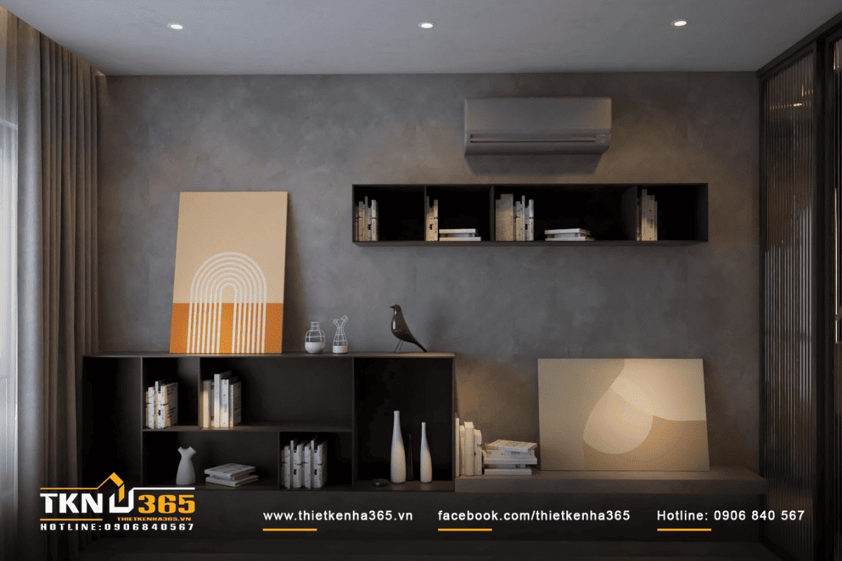 Điểm nhấn cho nội thất ngôi nhà là bức tranh trừu tượng và kệ sách gỗ