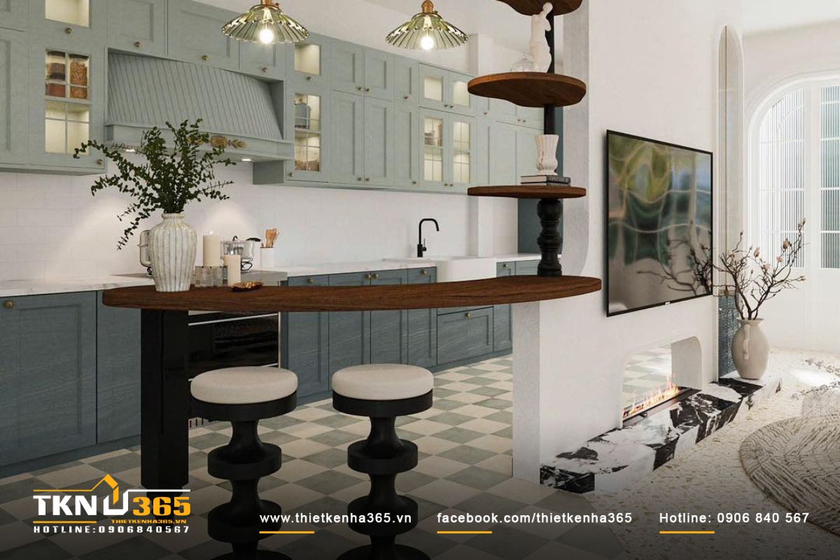 Phòng bếp sử dụng màu xanh mint chủ đạo và gỗ sáng, mang lại cảm giác sạch sẽ và hiện đại