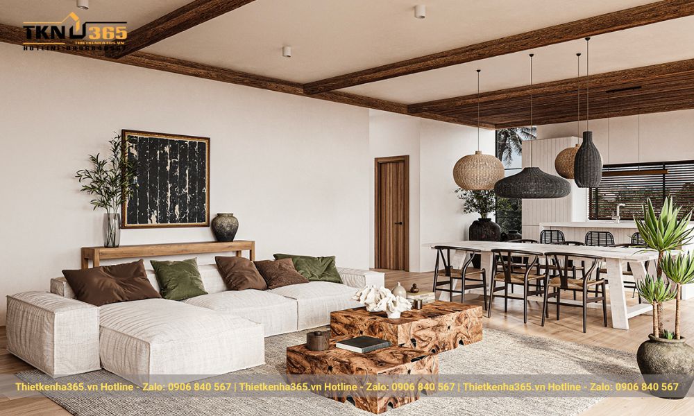 Phòng khách và bếp thông nhau tạo nên không gian sinh hoạt chung, thích hợp cho kỳ nghỉ dưỡng của cả gia đình