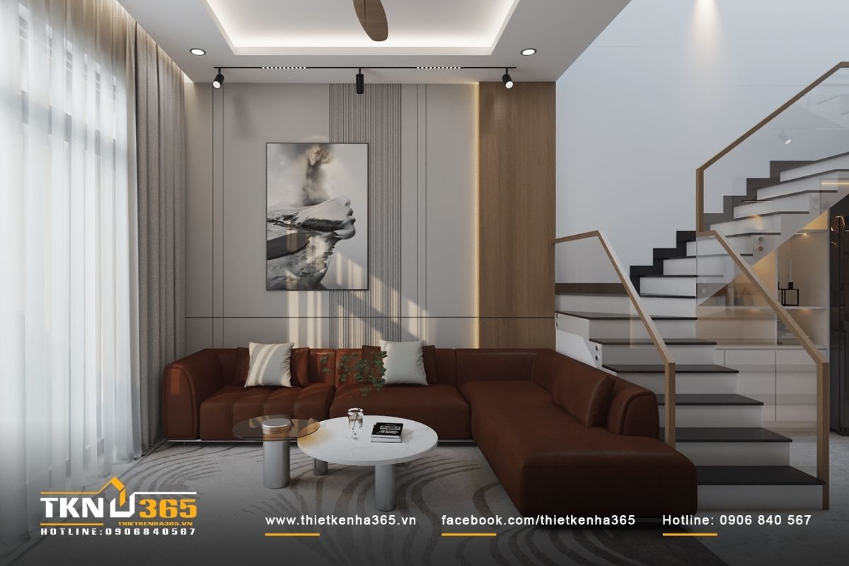 Phòng khách tinh tế với bộ sofa êm ái cùng tone màu trắng của ngôi nhà