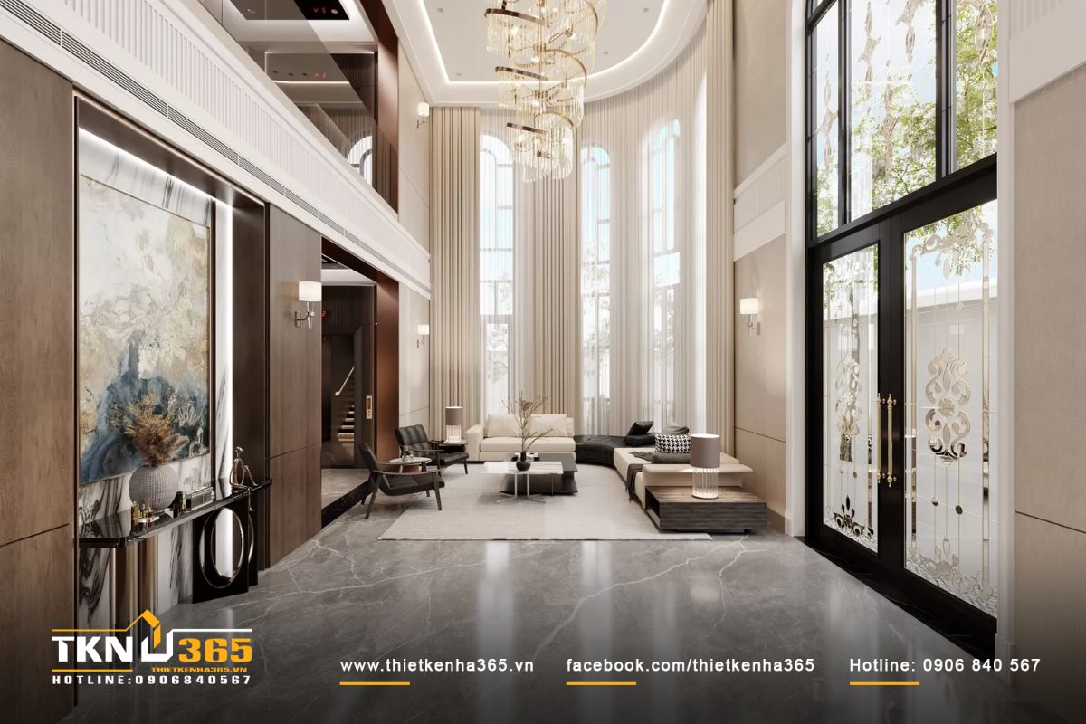 Phòng khách được sắp xếp ngay lối vào chính và gần các cửa sổ lớn, giúp tận dụng tối đa ánh sáng tự nhiên