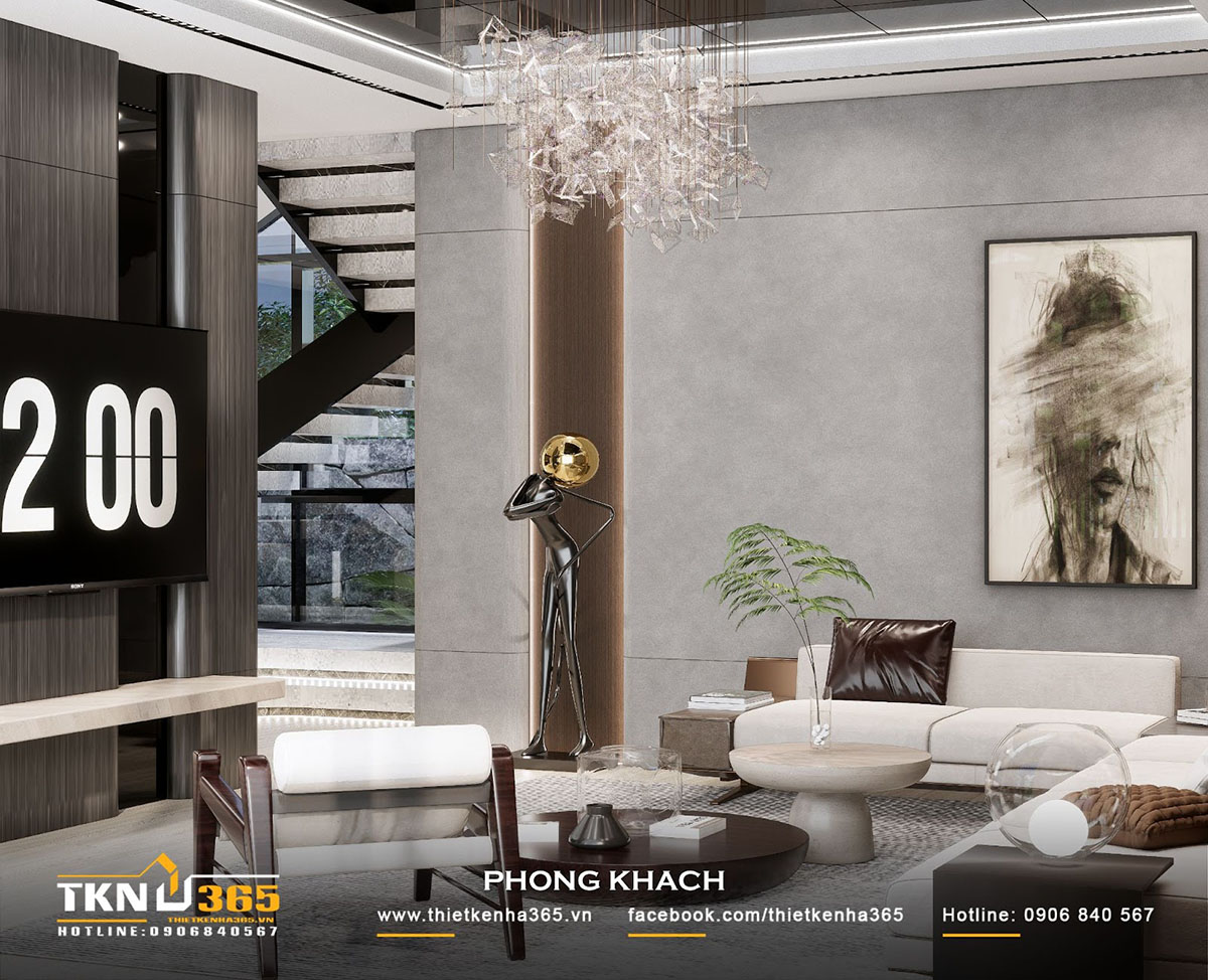 Đèn thả trần họa tiết cầu kỳ là điểm nhấn trung tâm của phòng khách