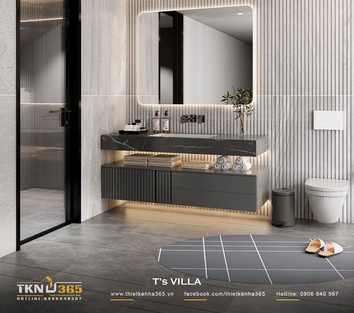 Hệ lavabo bằng đá đen kết hợp tủ treo phẳng gọn, đèn led âm hắt tinh tế, giữ cho không gian vừa sang trọng vừa tiện nghi