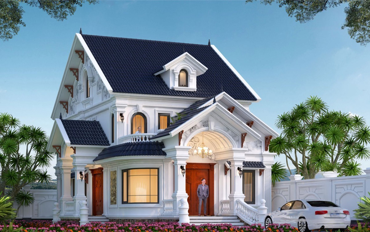 Với màu trắng chủ đạo, kết hợp mái Thái xanh và cửa gỗ đỏ, ngôi biệt thự không chỉ nổi bật với vẻ đẹp ngoại thất mà còn hòa quyện với thiên nhiên nhờ không gian sân vườn xanh mát, tiểu cảnh rực rỡ.