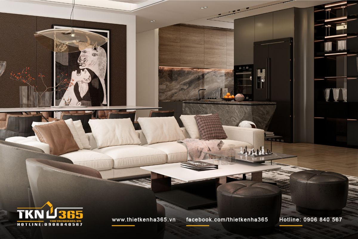 Không gian sinh hoạt chung thiết kế liền mạch, sofa vải sáng màu phối cùng ghế bọc da và bàn đá vân tự nhiên