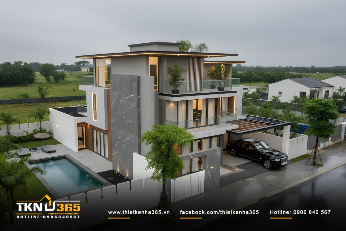 Hồ bơi trải dài dọc công trình, trở thành ranh giới mềm mại giữa khối nhà chính và khu vực sân vườn