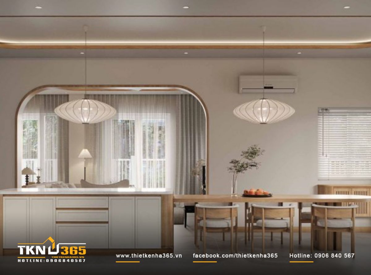 Hệ trần bo cong với dải đèn hắt chạy viền quanh tạo hiệu ứng ánh sáng thu hút, làm nổi bật tinh thần “làm mềm không gian sống” của P’s House