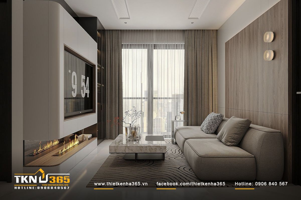 Bộ sofa dáng thấp màu trung tính cùng bàn trà mặt đá và tấm thảm họa tiết nhẹ nhàng phân tách khu vực tiếp khách một cách tinh tế