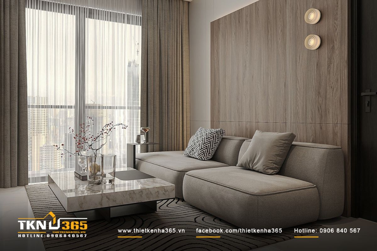 Tường ốp gỗ veneer và rèm vải dày hai lớp mang lại cảm giác ấm áp, đón ánh sáng tự nhiên lan tỏa khắp không gian sống