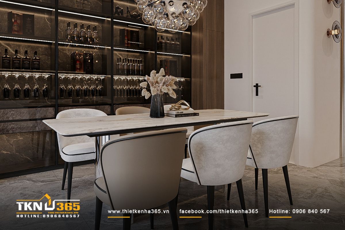 Vẻ đẹp của phòng ăn được “nâng cấp” nhờ hệ tủ rượu âm tường và ánh sáng “ẩn” nhẹ nhàng