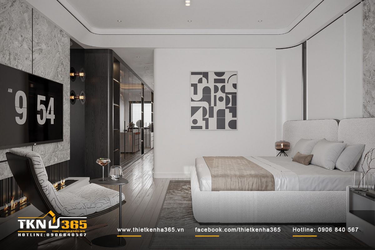 Các chi tiết uốn cong ở trần và tường làm mềm mại tổng thể phòng ngủ