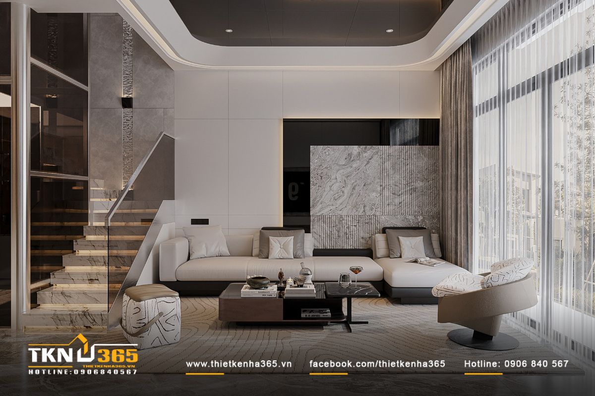 Thiết kế mở liền mạch giữa phòng khách và cầu thang, kết nối hài hòa khu vực sinh hoạt chung và không gian riêng tư