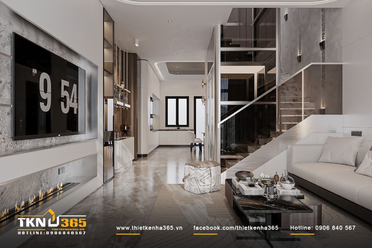 Từ phòng khách nhìn về khu bếp - ăn, không gian mở liền mạch giúp sinh hoạt và giao tiếp thuận tiện