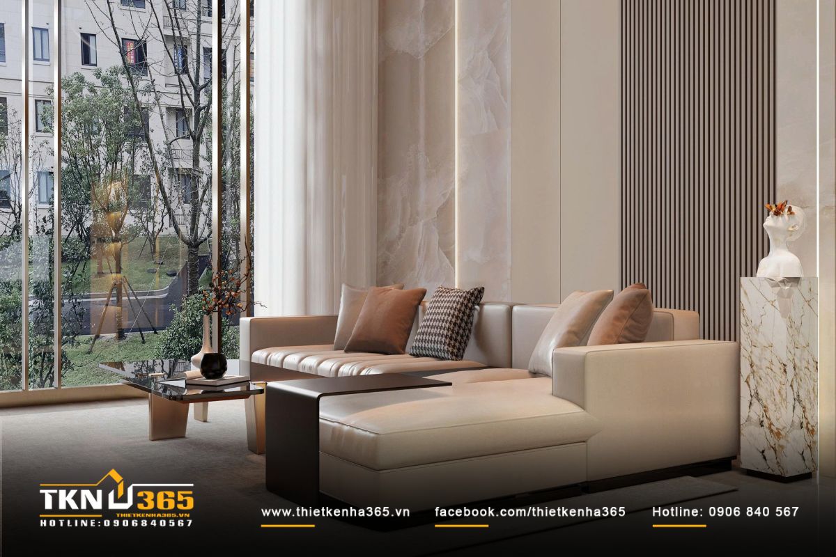 Bức tường ốp đá vân mây kết hợp lam dọc và ánh sáng khe tinh tế giúp không gian thêm chiều sâu, nhẹ nhàng mà hiện đại