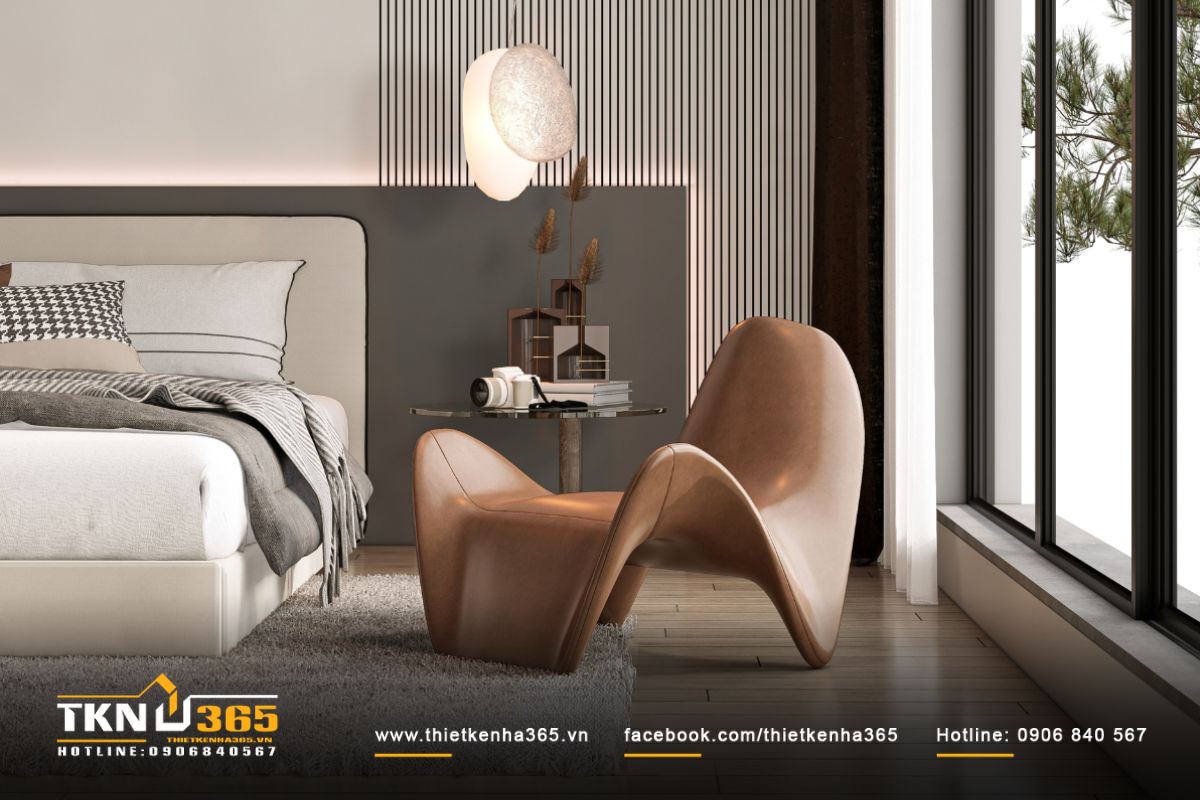 Chiếc ghế lounge cong mềm đặt cạnh cửa sổ chính là góc đọc sách và thư giãn thú vị