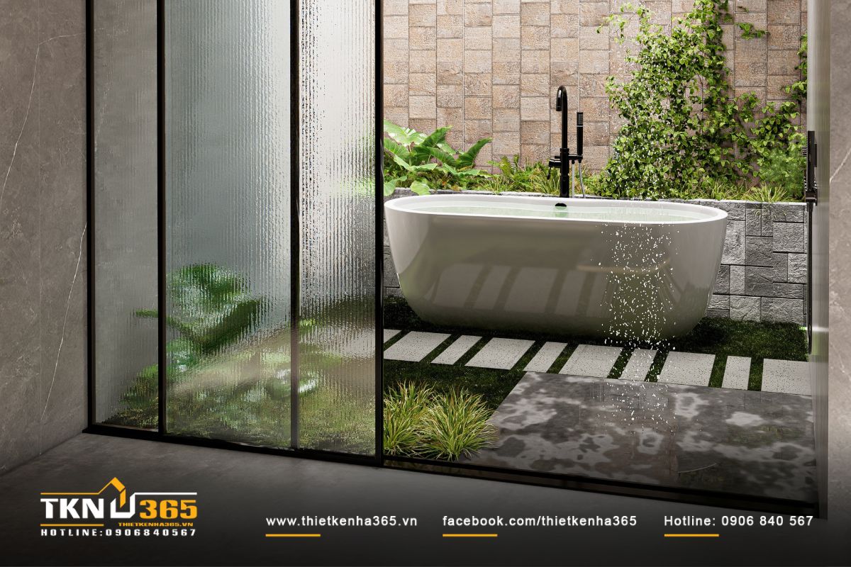 Phòng tắm D’s Villa được thiết kế như một spa thu nhỏ, bồn tắm đặt cạnh khu vườn xanh lát đá tạo cảm giác thư giãn giữa thiên nhiên