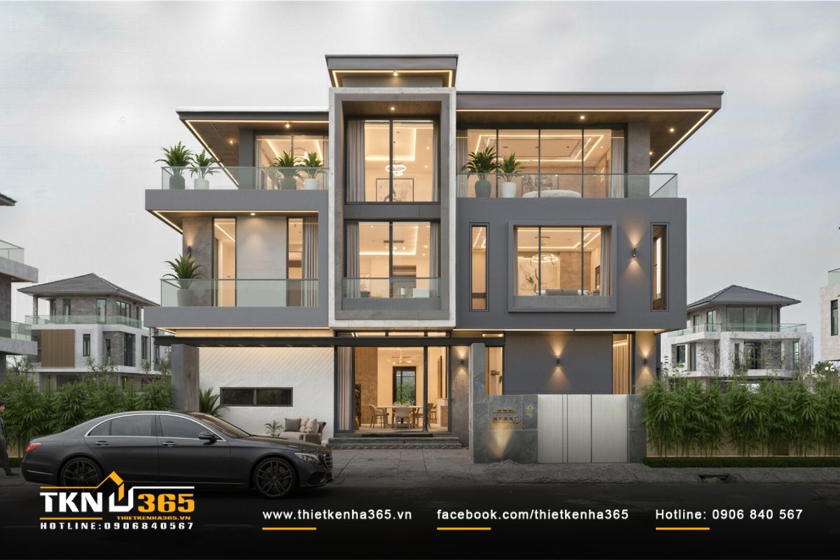 Toàn cảnh mặt tiền biệt thự 3 tầng cho thấy hình khối vuông vắn, đường nét mạch lạc và ánh sáng hắt trần làm mềm tổng thể kiến trúc