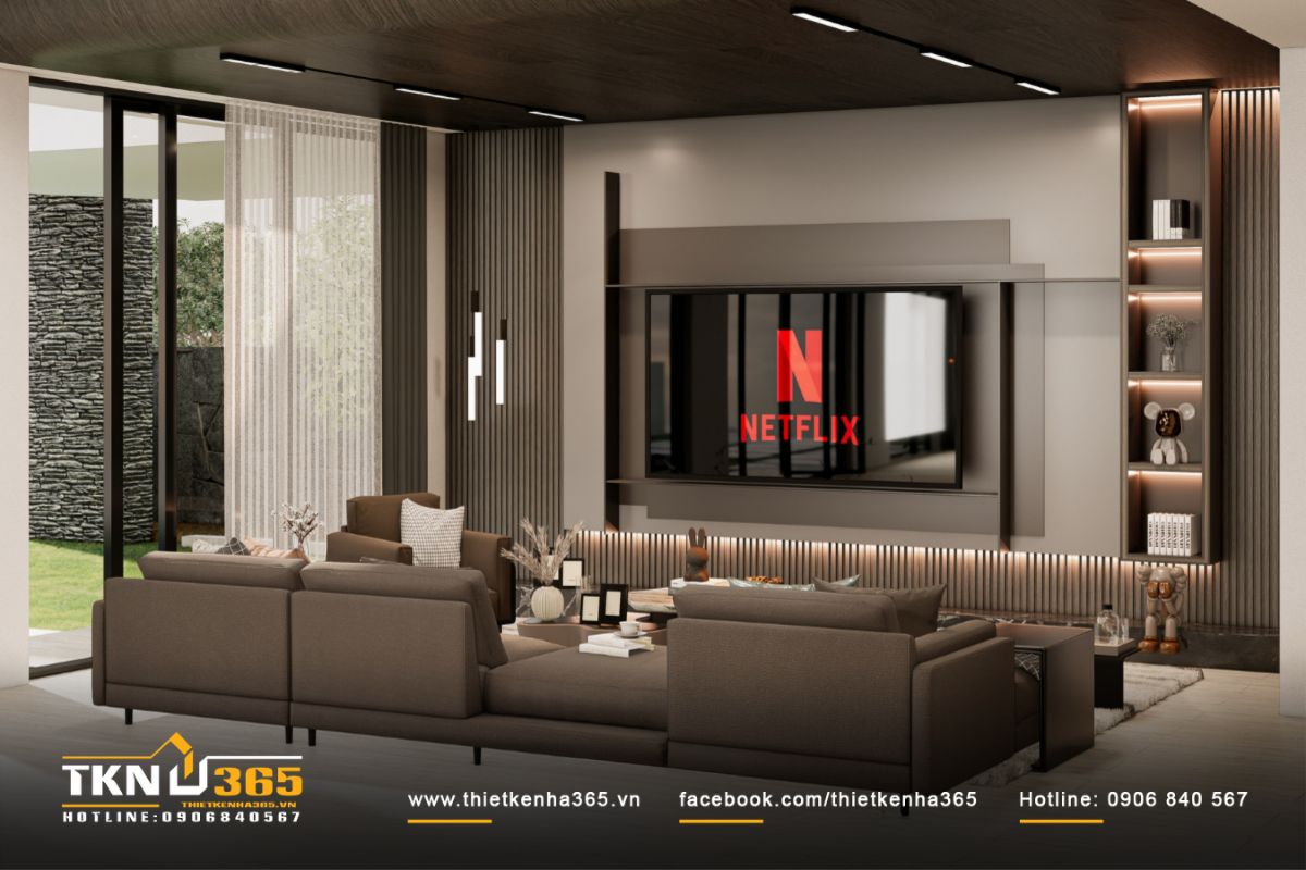 Vách tivi ốp lam gỗ kết hợp hệ tủ trang trí âm tường, ánh sáng gián tiếp tinh tế tôn lên chiều sâu vật liệu