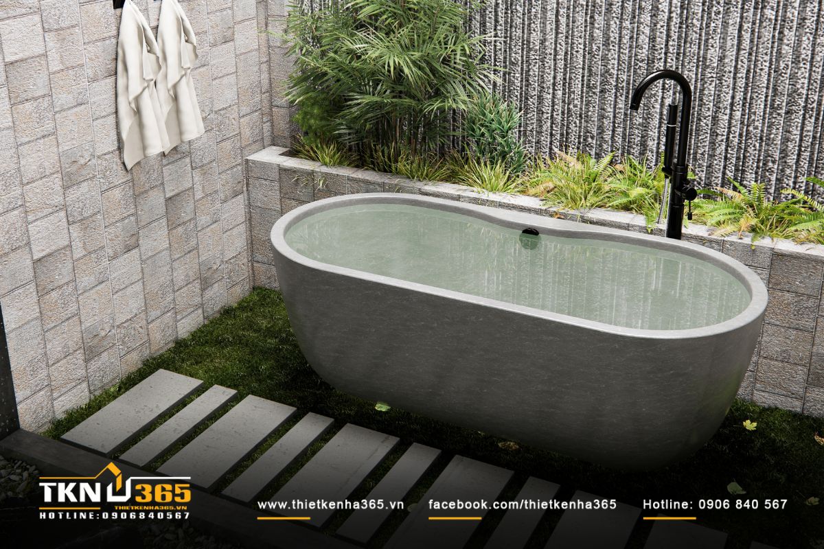 Tường đá xẻ rãnh và thảm thực vật ưa ẩm tạo nên khung cảnh thư giãn như một spa tại gia