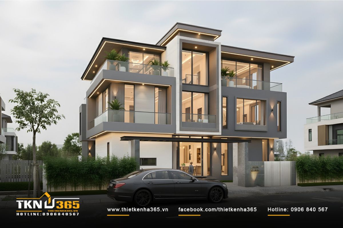 Mặt tiền hướng phố được làm mềm bằng giàn pergola sắt đen và hàng trúc thấp