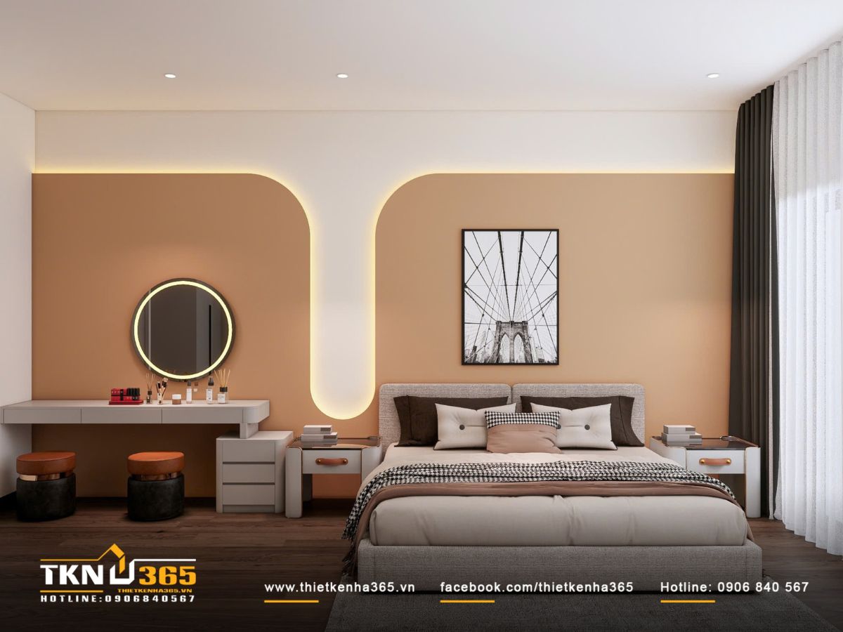 Bức tường đầu giường xử lý bo cong mềm mại kết hợp đèn hắt khe, giúp căn phòng toát lên vẻ tinh tế và thư giãn