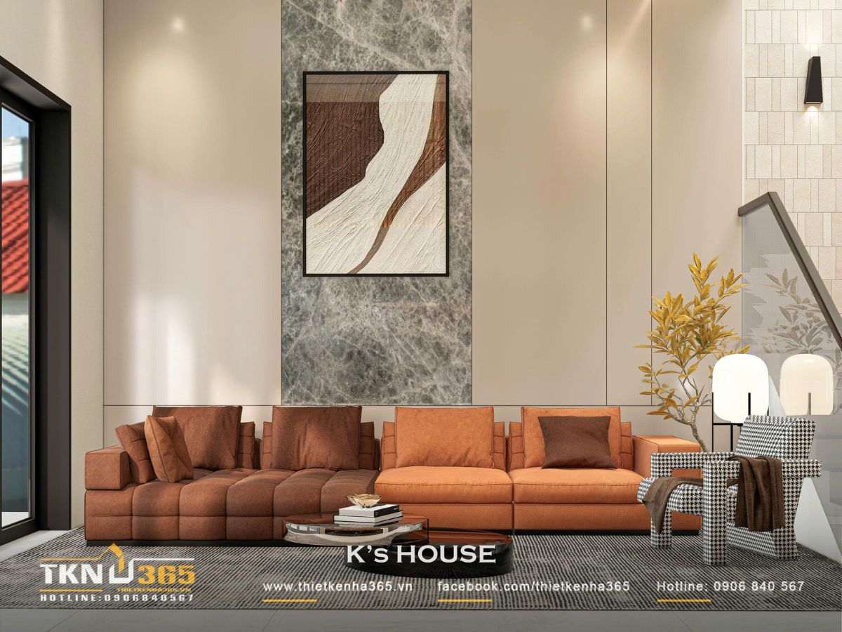 Phòng khách mở liên thông với bếp, cầu thang kính trong giúp ánh sáng lan tỏa đều khắp không gian, tạo cảm giác rộng và liền mạch