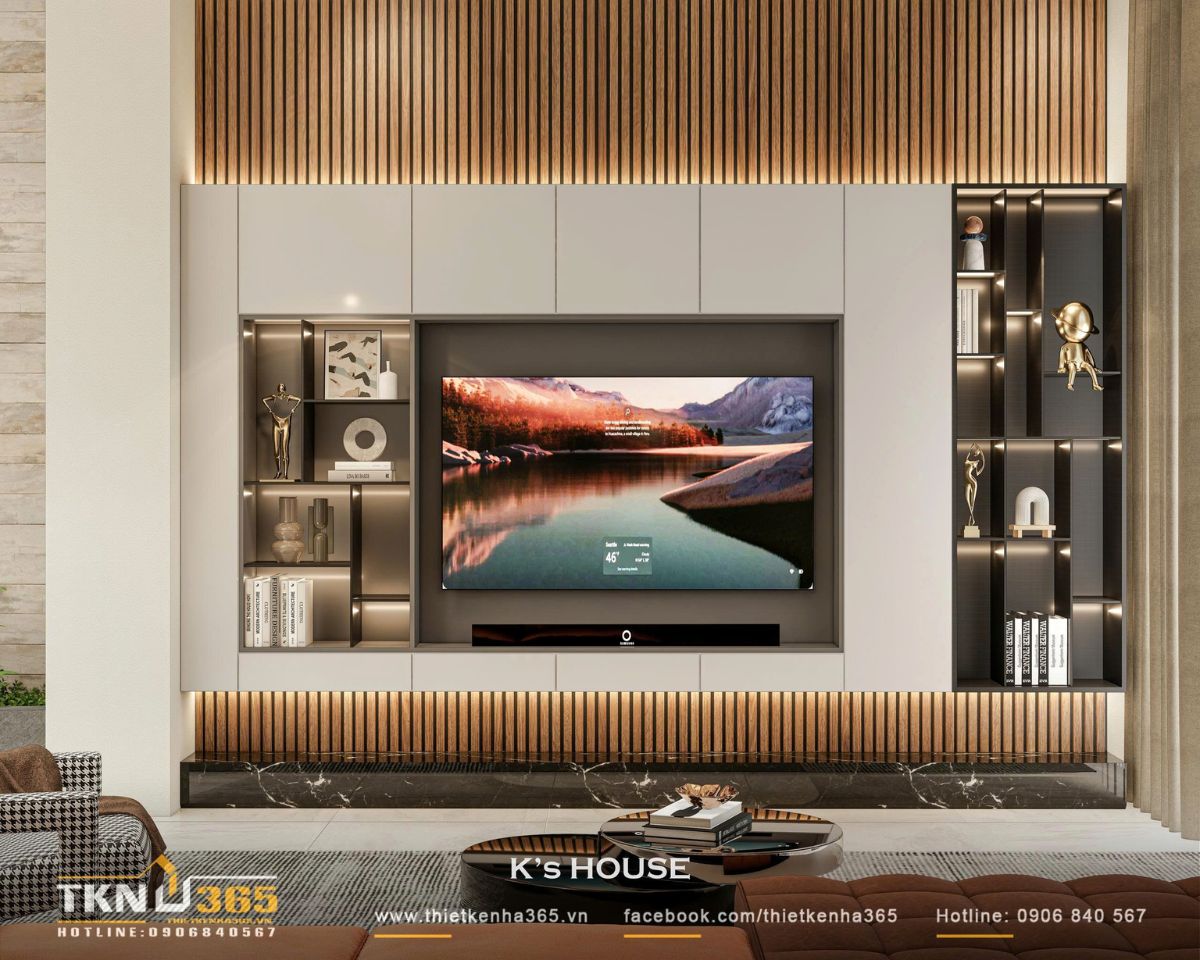 Hệ tủ tivi thiết kế phẳng, đèn hắt khe tinh tế tôn lên kết cấu gỗ và kim loại, giữ trọn vẻ sang trọng mà vẫn hài hòa tổng thể