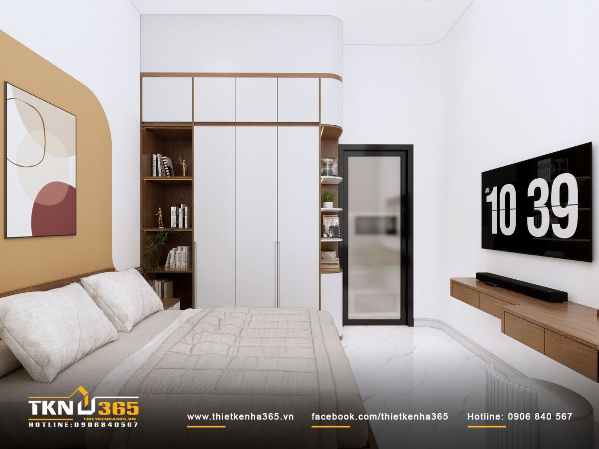 Phòng ngủ phụ trẻ trung với mảng tường màu pastel và hệ tủ kết hợp kệ mở tiện dụng