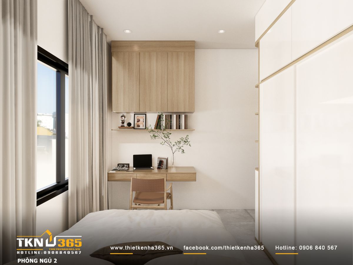 Góc học tập nhỏ gọn với hệ tủ treo và ánh sáng tự nhiên tràn vào từ khung cửa sổ