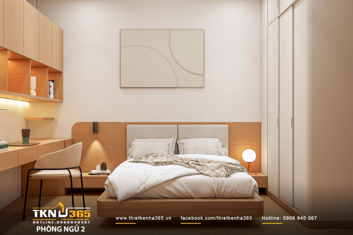 Phòng ngủ thứ hai sử dụng tông màu be và gỗ sáng, giữ vẻ trang nhã và cân bằng