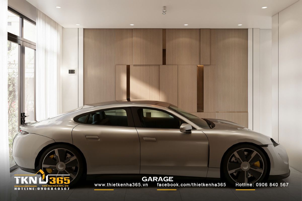 Trần và tường màu sắc trung tính kết hợp đèn âm trần phân bố đều giúp không gian thoáng sáng và an toàn khi di chuyển xe