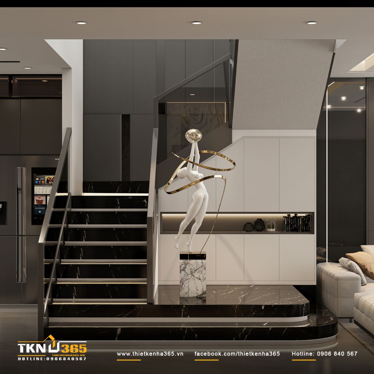 Không gian cầu thang tối giản với tủ âm tường và bậc đá đen, liên kết trôi chảy với phòng khách và tăng tính liền mạch cho toàn bộ tầng trệt