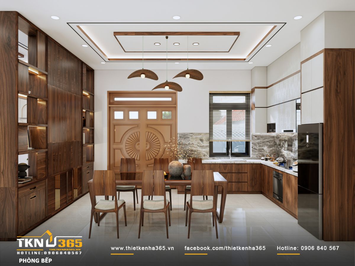 Không gian bếp - ăn liền mạch phòng khách, tủ bếp chữ L kết hợp đá ốp vân xám giúp khu vực nấu nướng gọn gàng, thoáng và dễ sử dụng cho ba mẹ