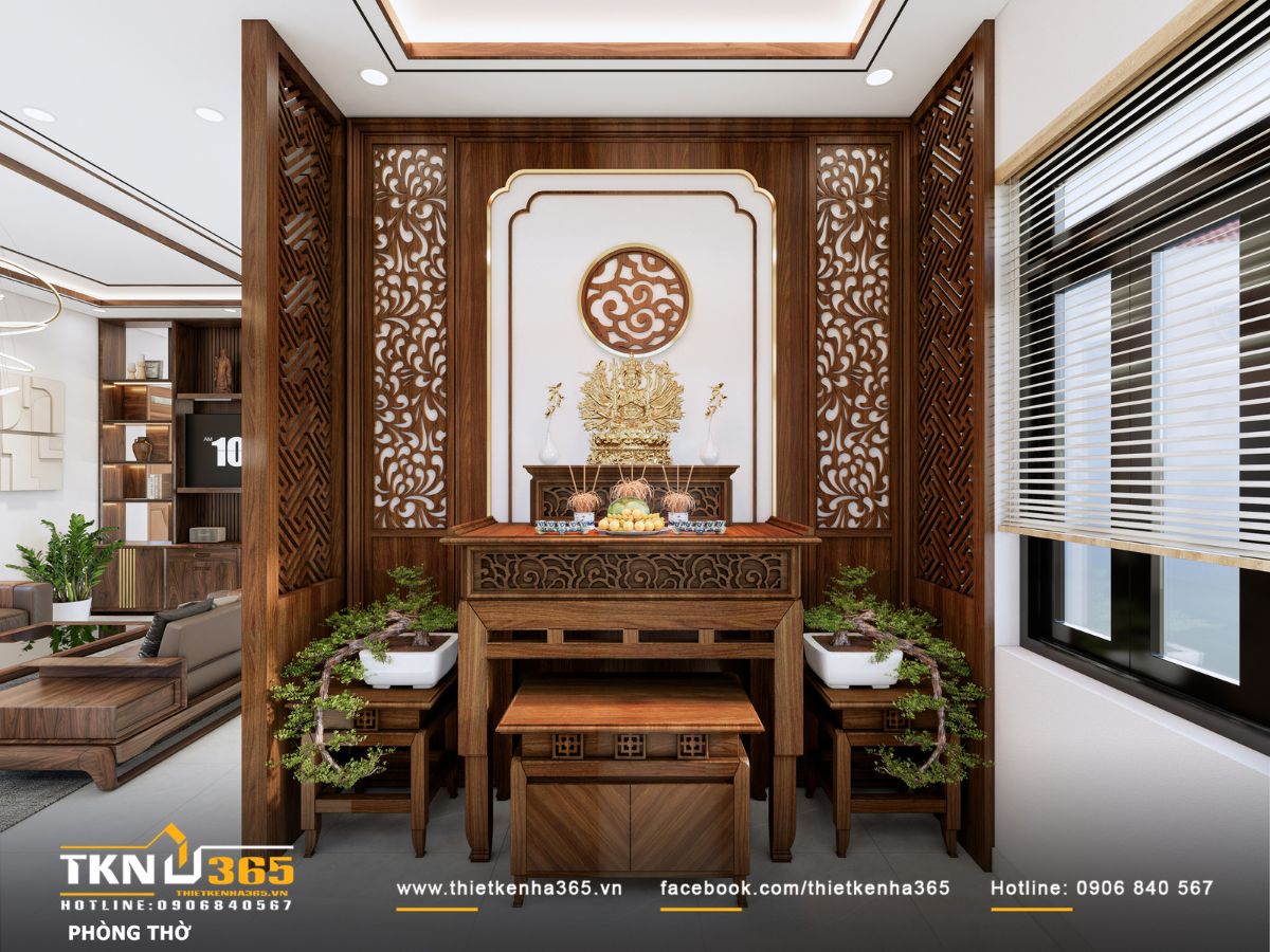 Bàn thờ gỗ chạm khắc tinh xảo, vách lam CNC hai bên và hai chậu bonsai bố trí cân bằng, giữ bầu không khí linh thiêng mà vẫn hài hòa và ấm cúng