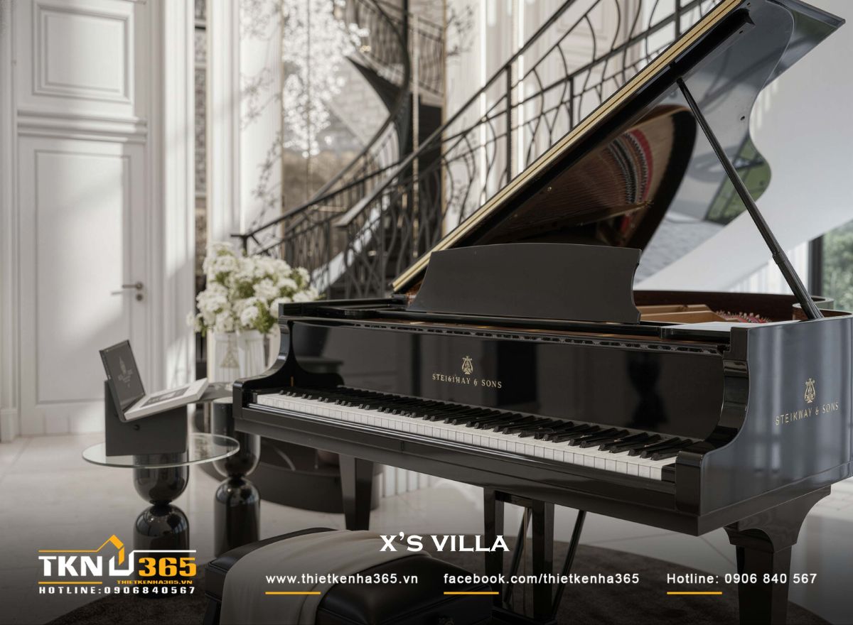 Khu vực th&ocirc;ng tầng đặt đ&agrave;n piano kết hợp cầu thang cong, tạo điểm chạm cảm x&uacute;c nhẹ nh&agrave;ng trong tổng thể nội thất t&acirc;n cổ điển