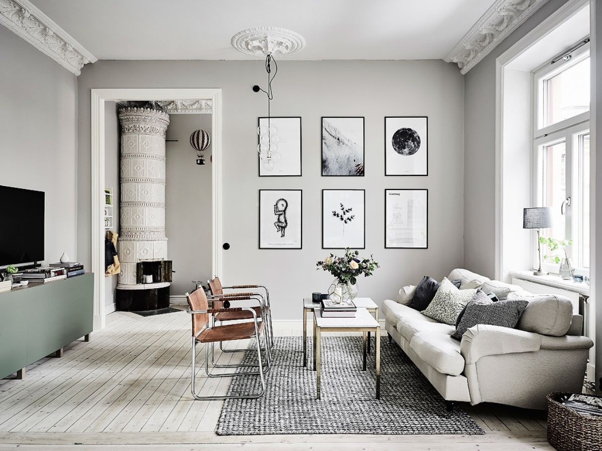 Màu trắng xám giúp phòng khách rộng rãi và sáng hơn nhưng không hề đơn điệu (Ảnh: Sưu tầm)