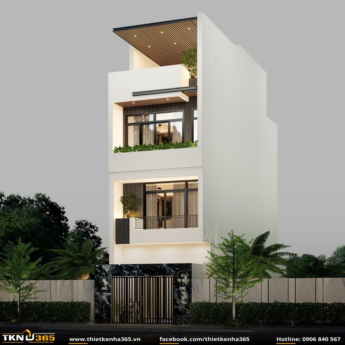 Hình khối vững chắc kết hợp trần lam gỗ và ban công rộng thoáng, giúp ngôi nhà đón sáng tự nhiên và tạo điểm nhấn mềm mại giữa khu phố