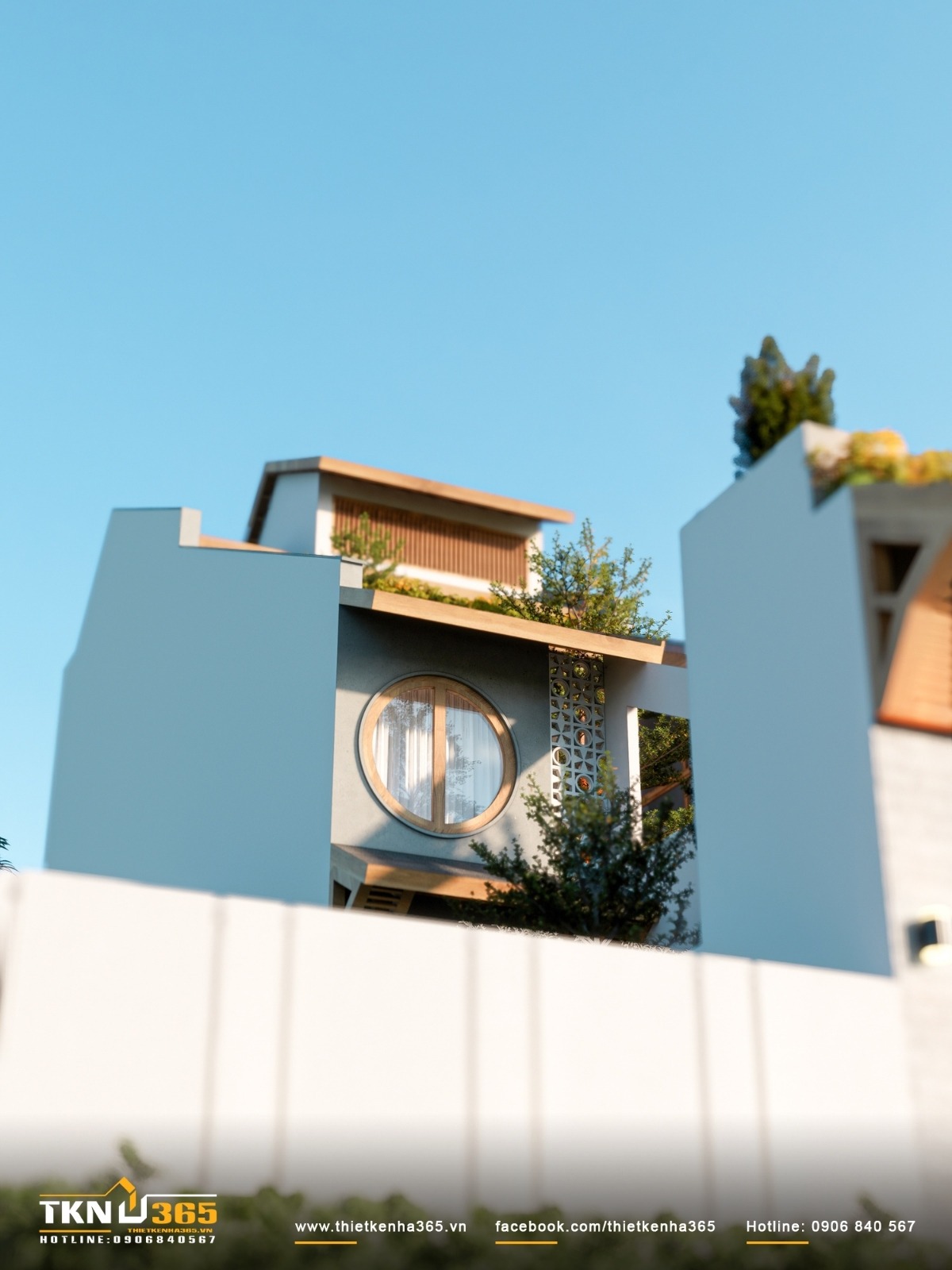 Cửa sổ tròn đặt lệch trục tại tầng lầu giúp cân bằng yếu tố mềm - cứng trong tổng thể kiến trúc hiện đại