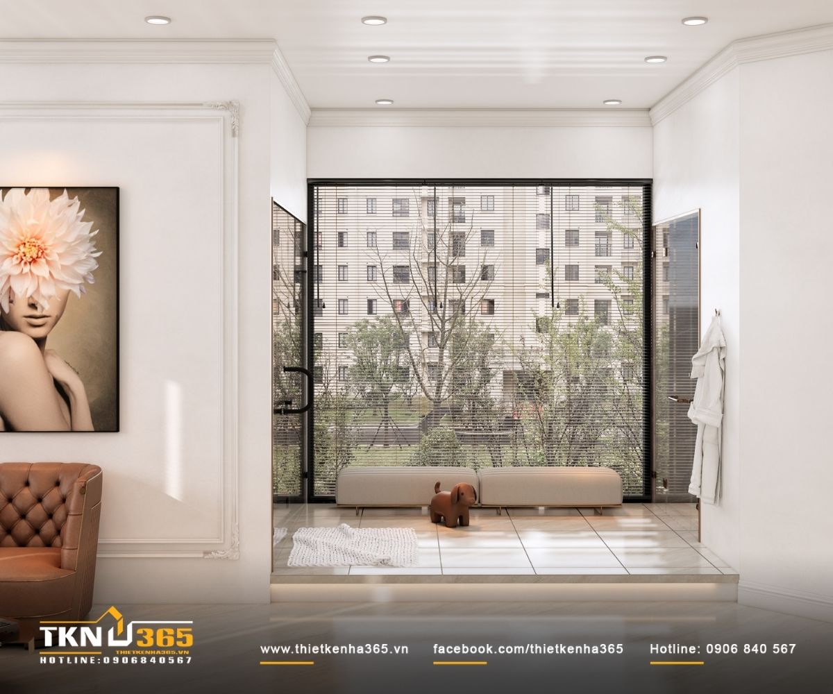Cửa k&iacute;nh lớn kết hợp r&egrave;m v&agrave; s&agrave;n n&acirc;ng, đưa &aacute;nh s&aacute;ng tự nhi&ecirc;n v&agrave;o kh&ocirc;ng gian tắm nhưng vẫn đảm bảo sự ri&ecirc;ng tư cần thiết