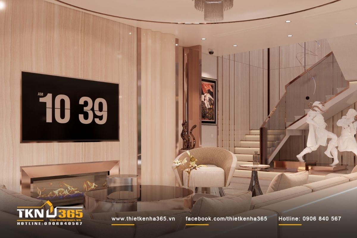 Sofa cong v&agrave; b&agrave;n tr&agrave; tr&ograve;n giữ vai tr&ograve; trung t&acirc;m thị gi&aacute;c, l&agrave;m mềm c&aacute;c mảng phẳng v&agrave; c&acirc;n bằng tỷ lệ lớn của kh&ocirc;ng gian biệt thự