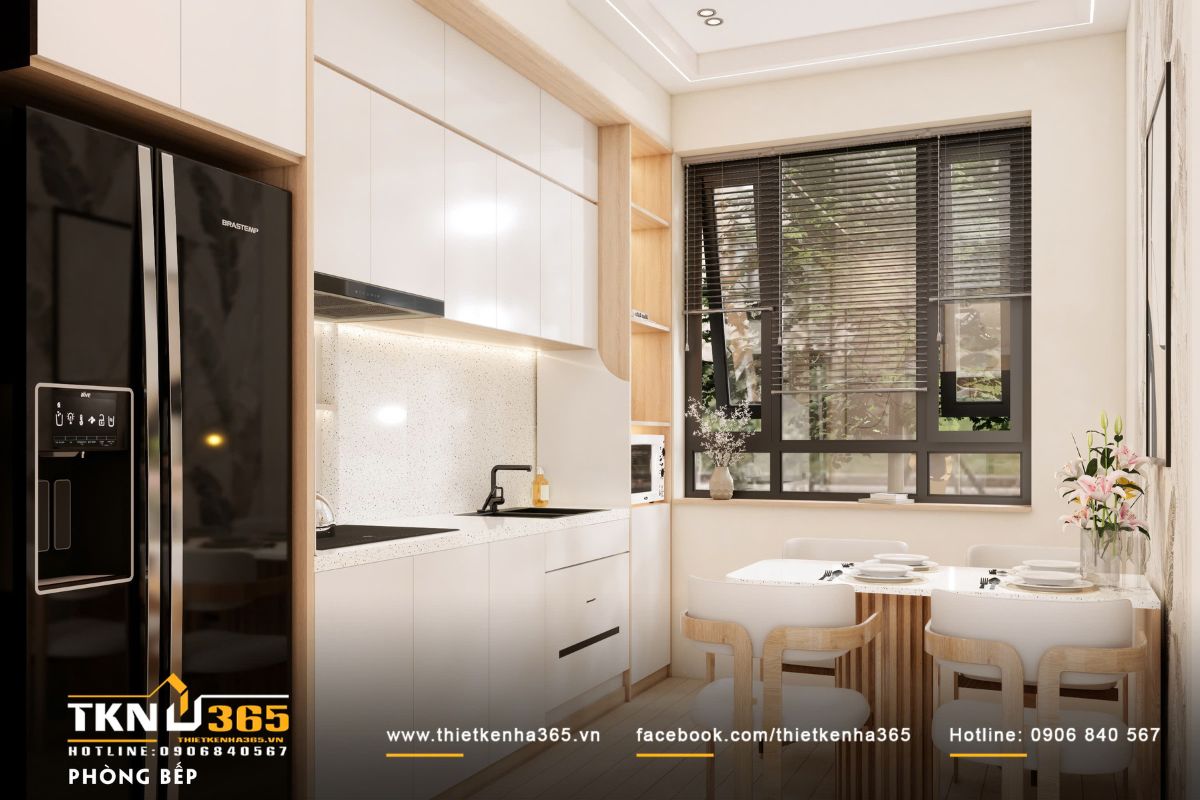 Khu vực bếp - ăn nh&agrave; phố 3 tầng bố tr&iacute; liền mạch, hệ tủ bếp chữ I cao kịch trần gi&uacute;p kh&ocirc;ng gian gọn g&agrave;ng v&agrave; dễ sử dụng