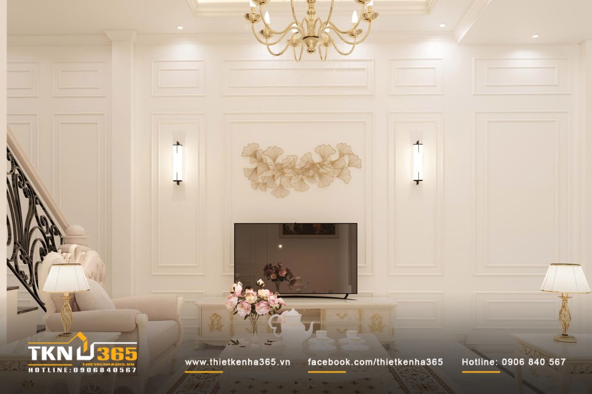 Mảng tường tivi xử l&yacute; ph&agrave;o chỉ c&acirc;n đối, kết hợp đ&egrave;n ch&ugrave;m v&agrave; đ&egrave;n tường l&agrave;m điểm nhấn vừa đủ, giữ nhịp thẩm mỹ ổn định cho ph&ograve;ng kh&aacute;ch