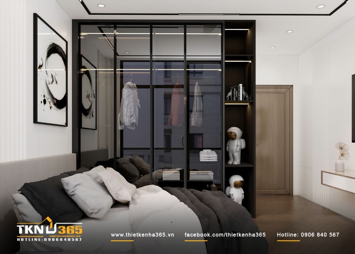 Hệ tủ quần &aacute;o c&aacute;nh k&iacute;nh khung đen tạo chiều s&acirc;u kh&ocirc;ng gian, đồng thời gi&uacute;p việc lưu trữ trở n&ecirc;n trực quan, ngăn nắp